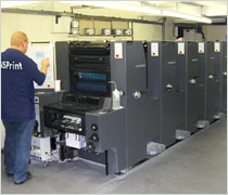 NS Print press men operating Heidelberg 5-colour Printmaster 52